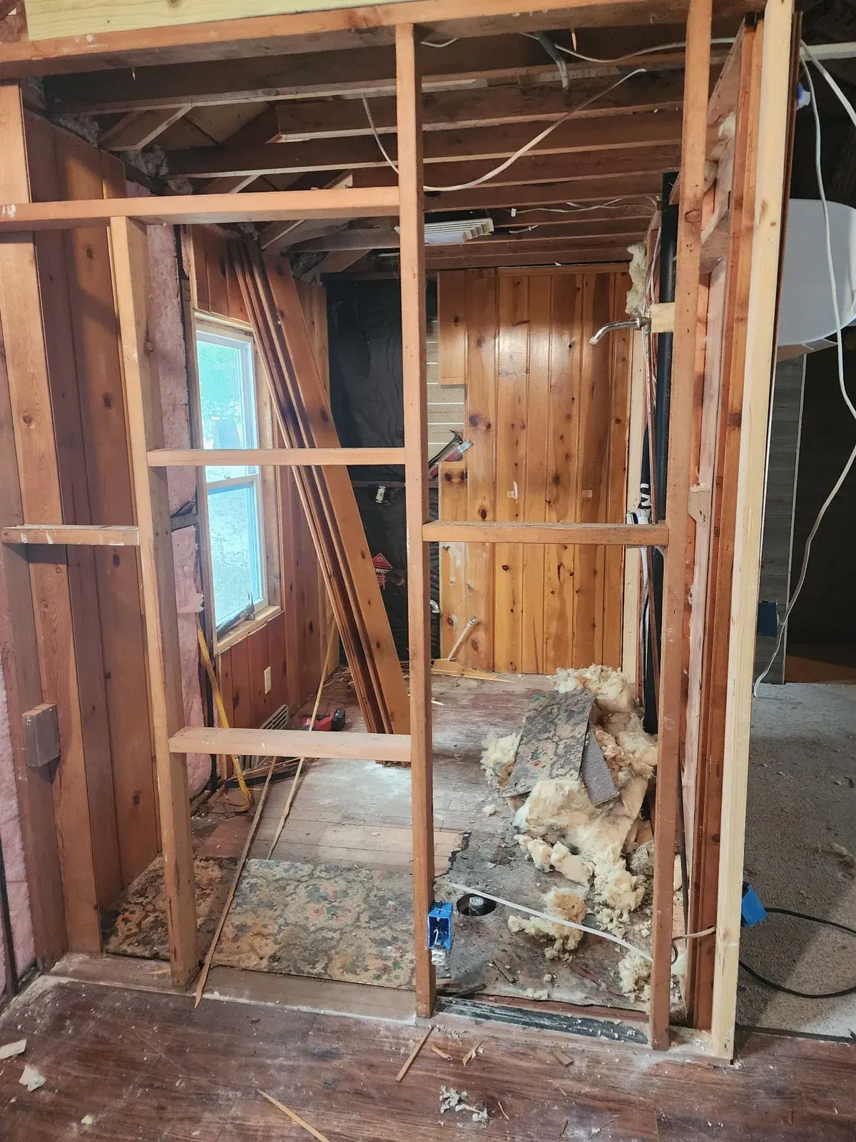 Bathroom demo during the cabin remodel
