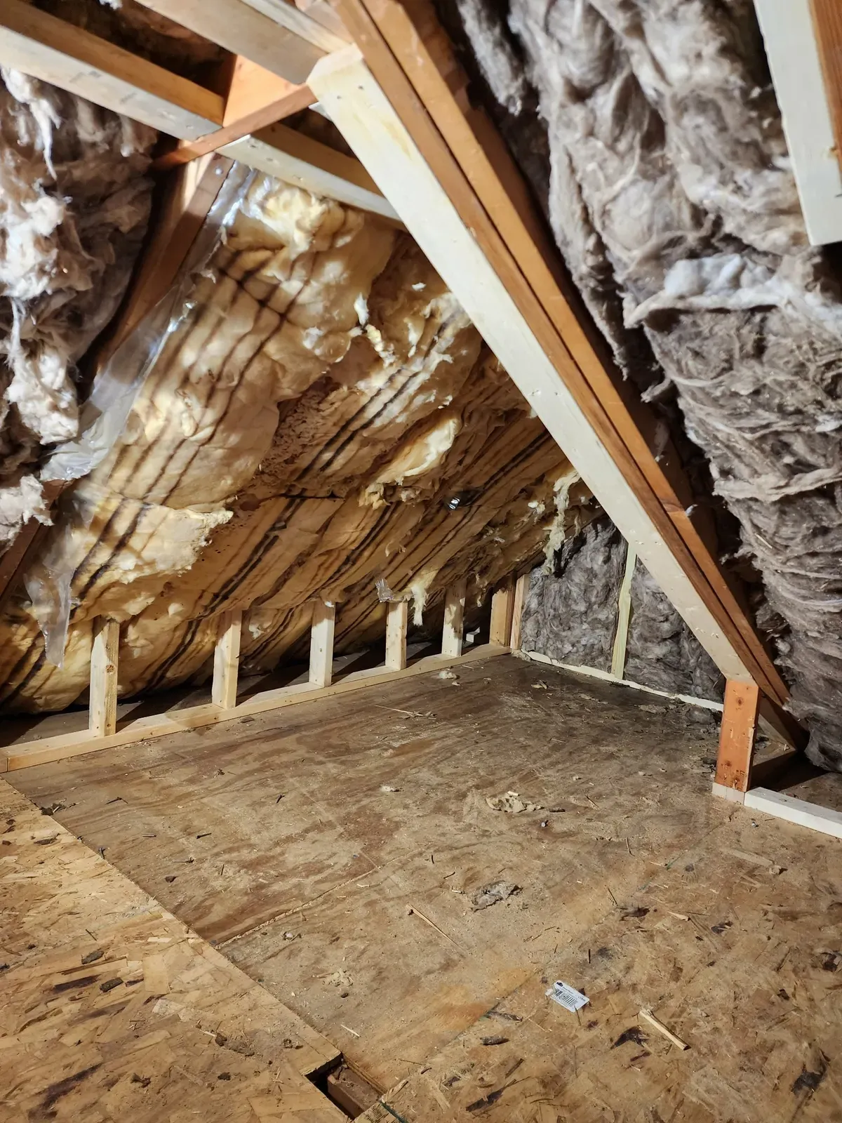 Attic kneewall during the cabin remodel