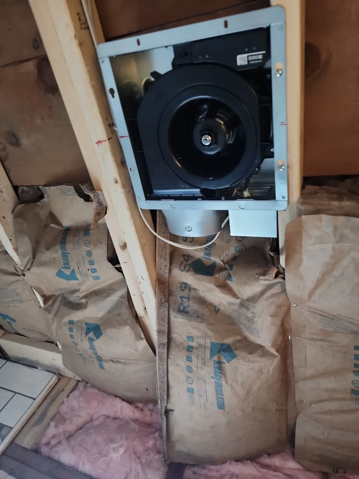 Bathroom exhaust fan installation during the cabin remodel