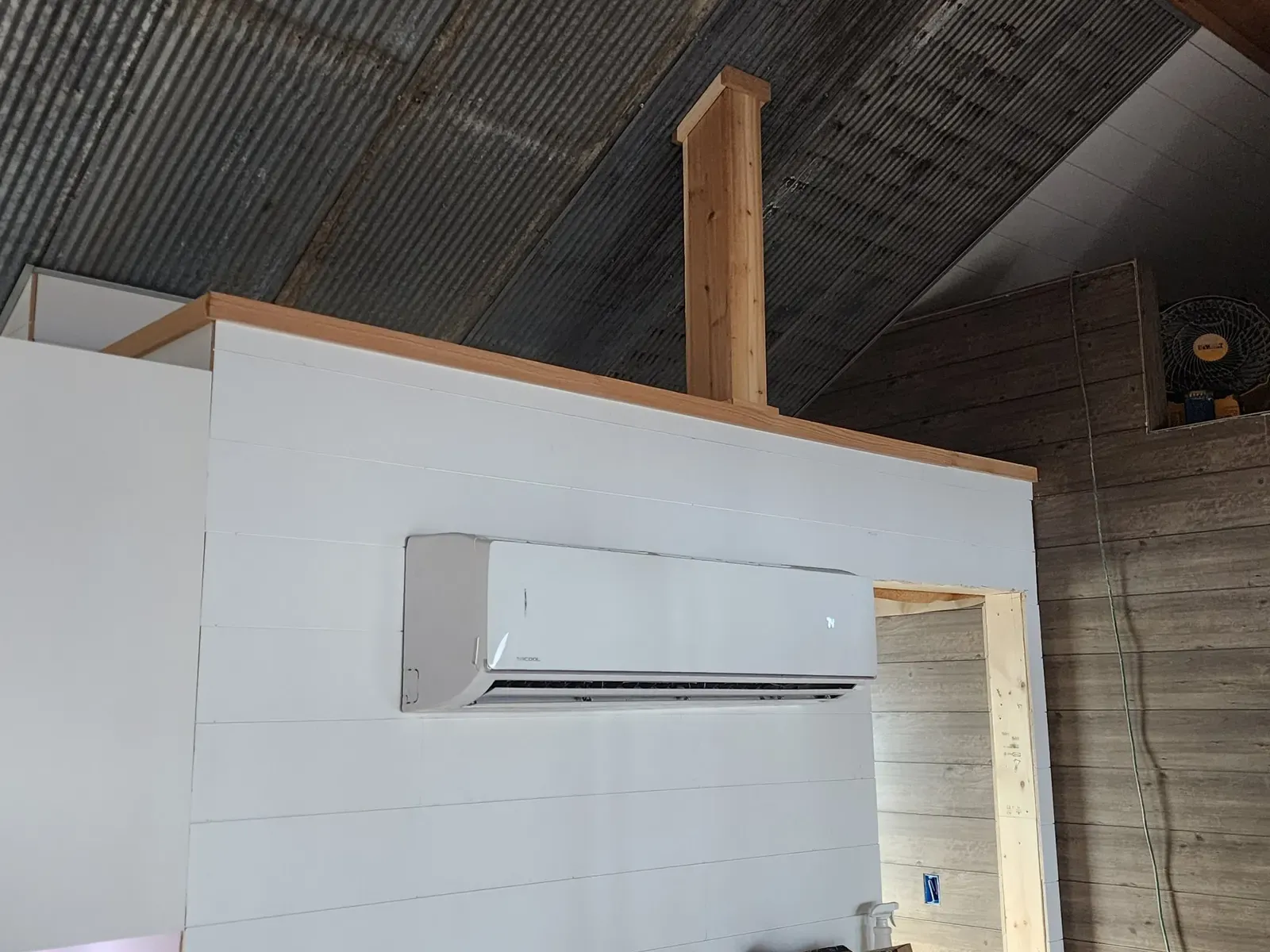 Loft shiplap and mini-split during the cabin remodel