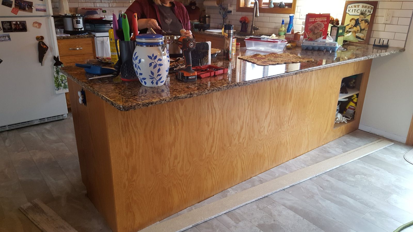 Plain oak kitchen island before the renovation