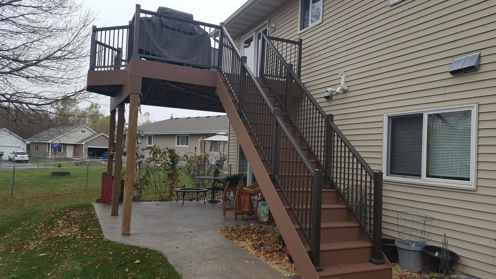 Side view of the finished composite deck with newly installed railings