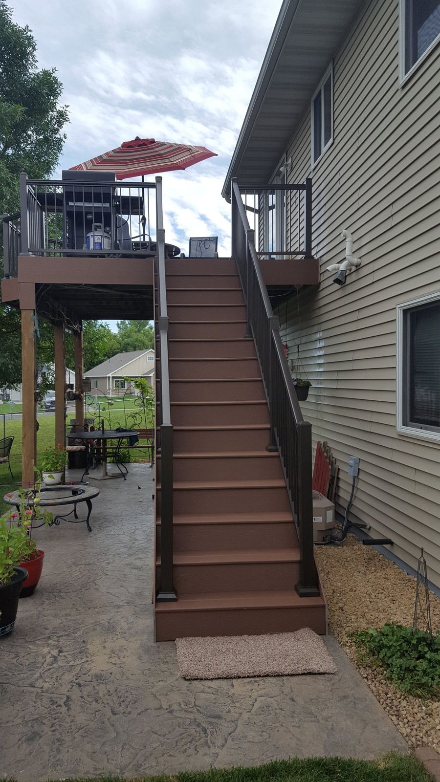 New composite stairway and railings leading up to the deck