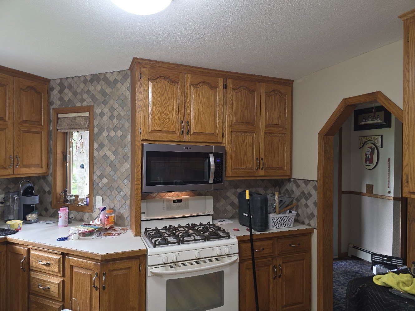 Finished kitchen around the stove and countertop