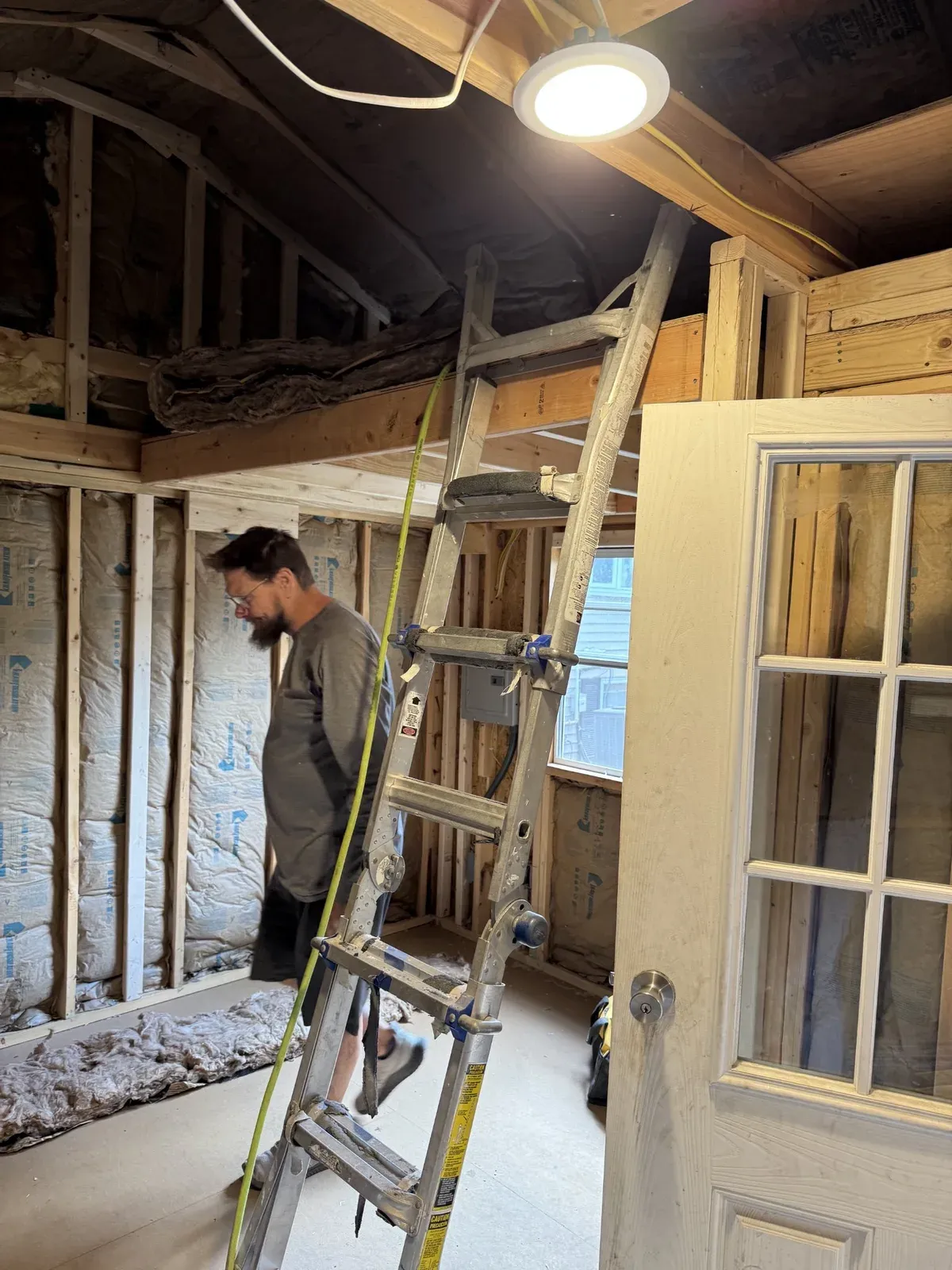 Loft framing and wall insulation during the shed conversion