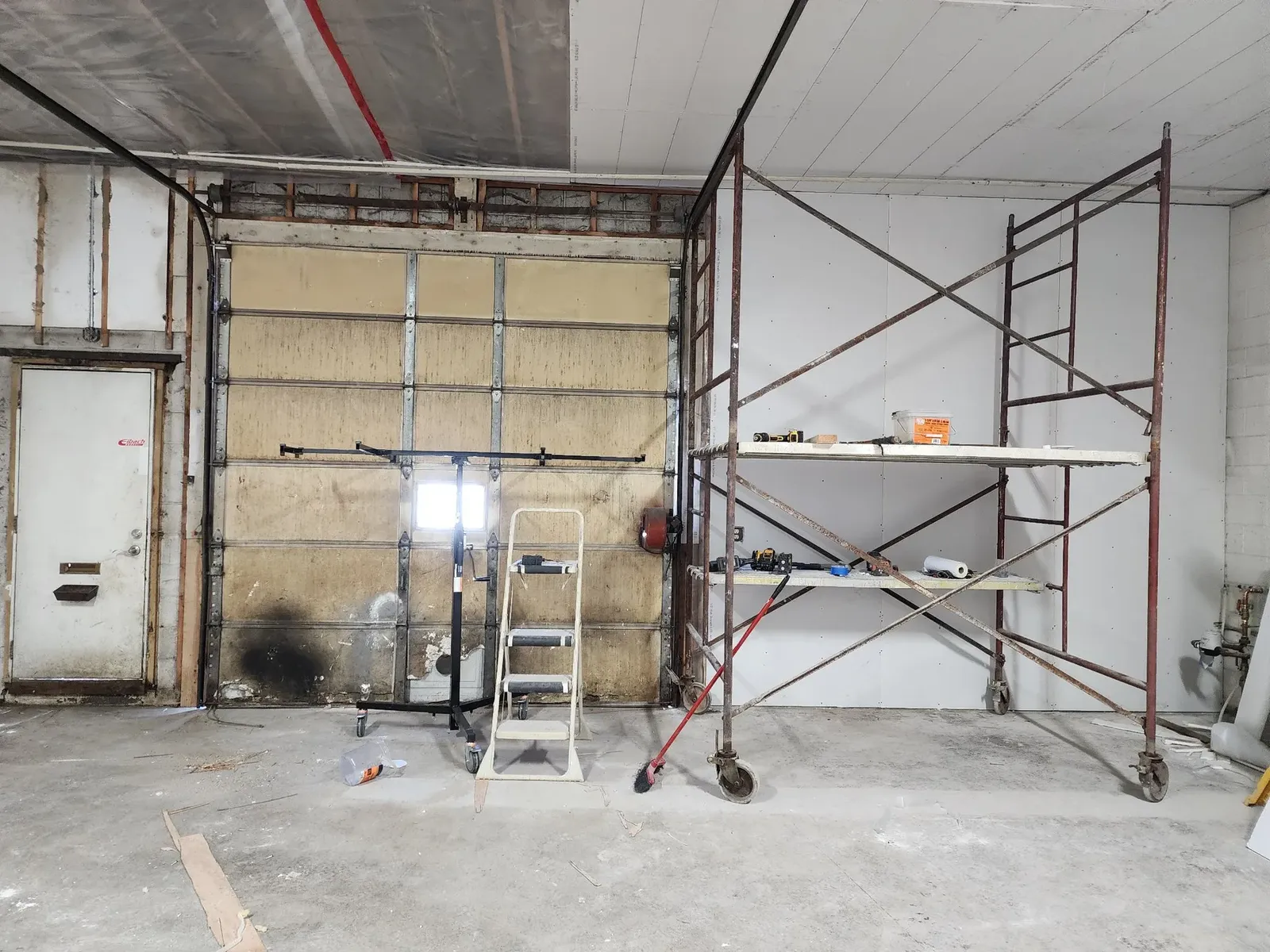 Former garage door area during the performance center build-out
