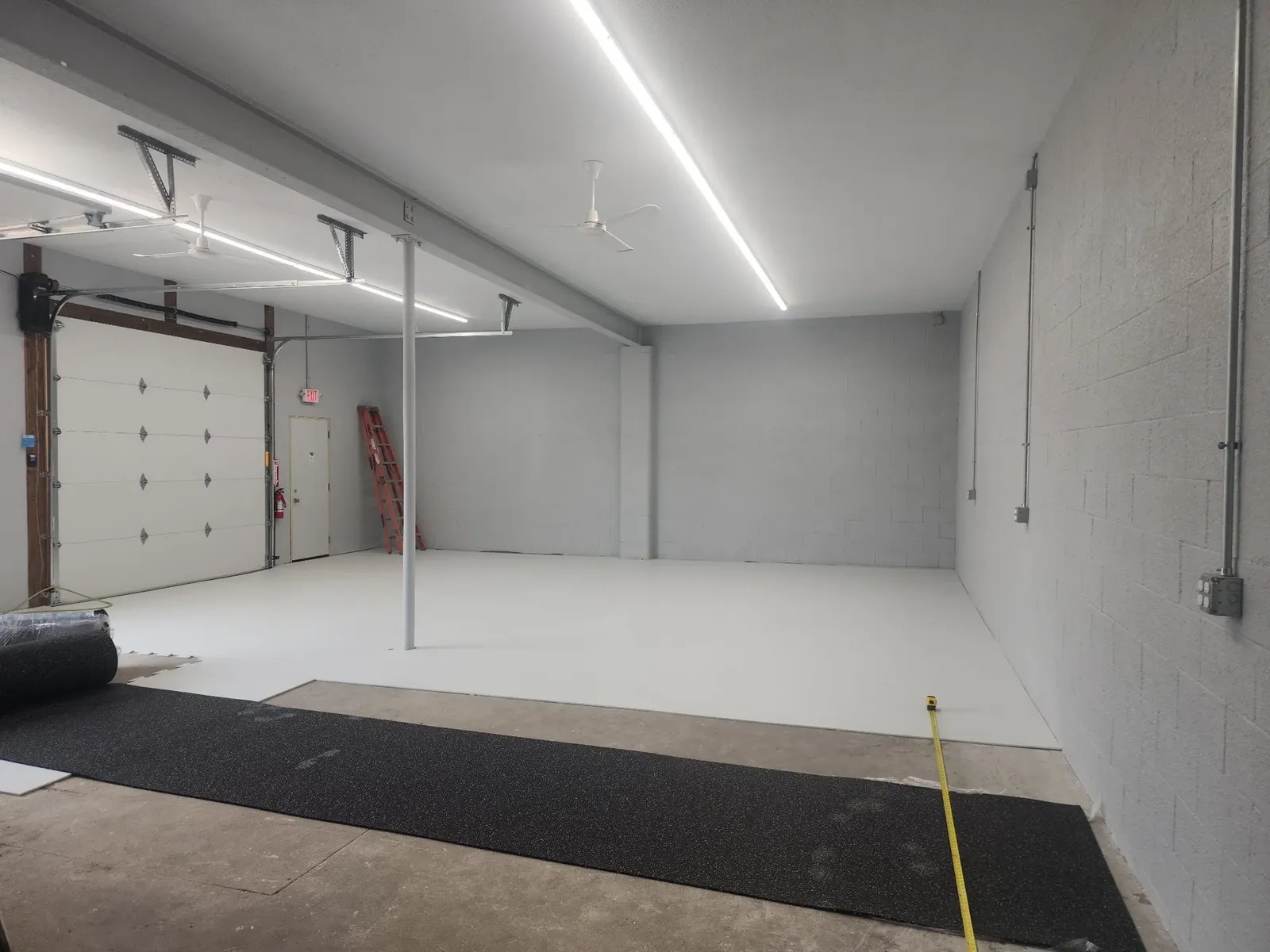 Finished hockey training bay with new walls, lighting, and flooring