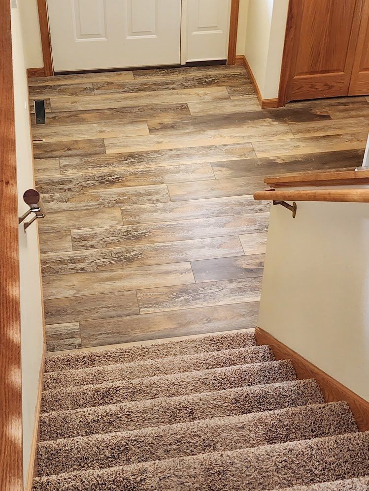Entryway finished with new plank flooring