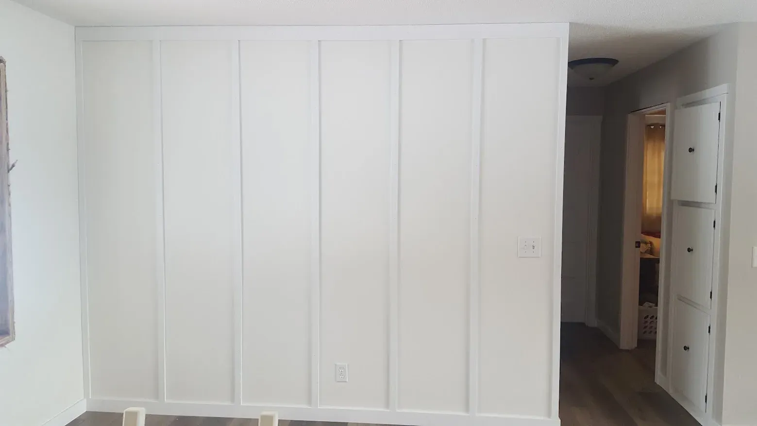 Finished room with a custom board-and-batten accent wall