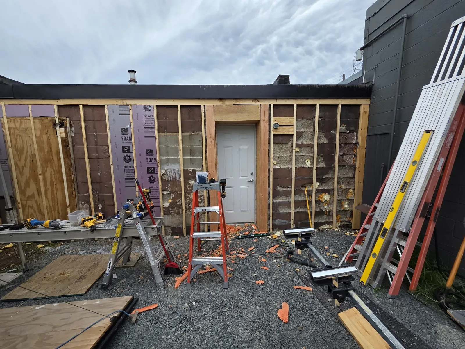 New entry door framed into the exterior wall