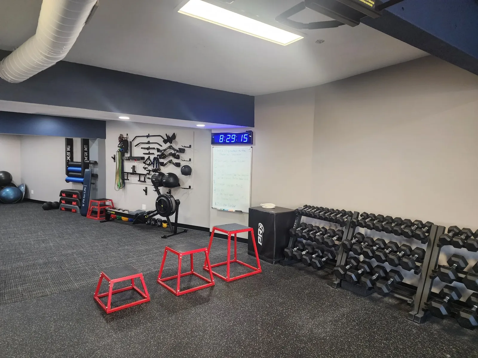 Finished dumbbell and conditioning area in the commercial gym