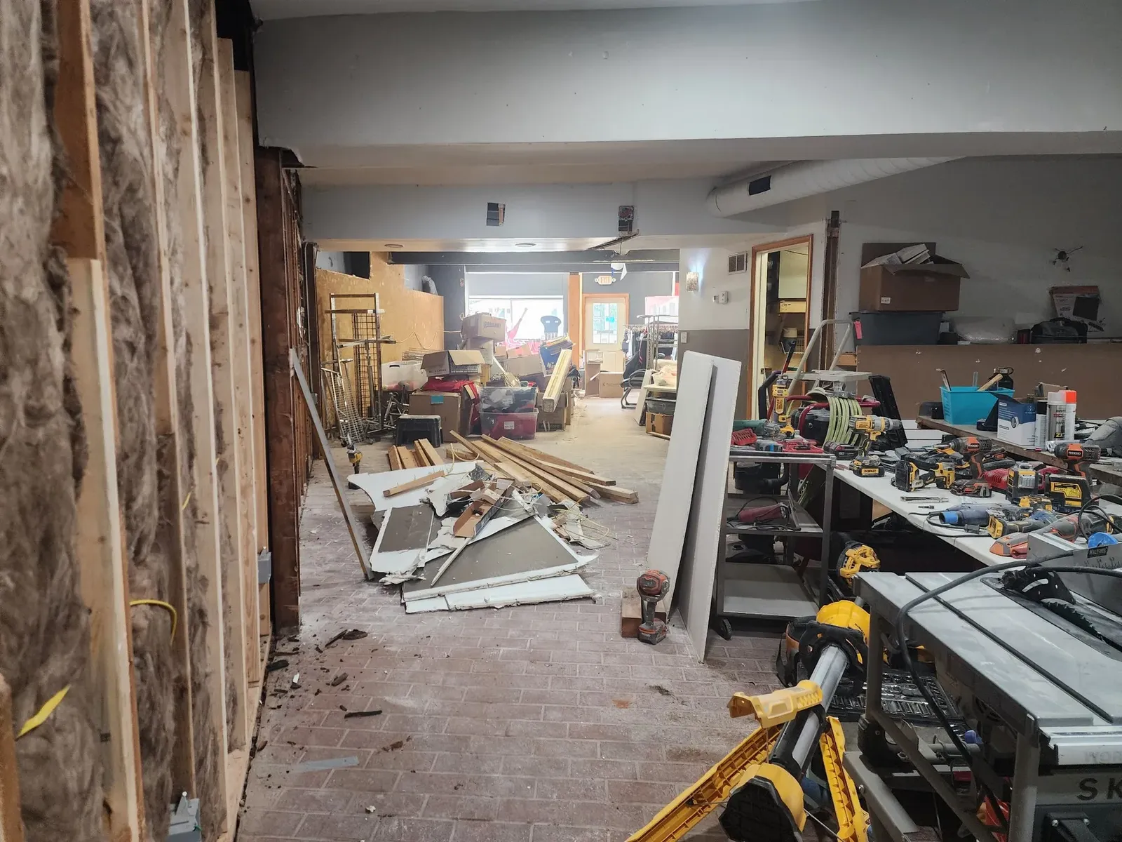 Commercial gym corridor during the early demolition stage