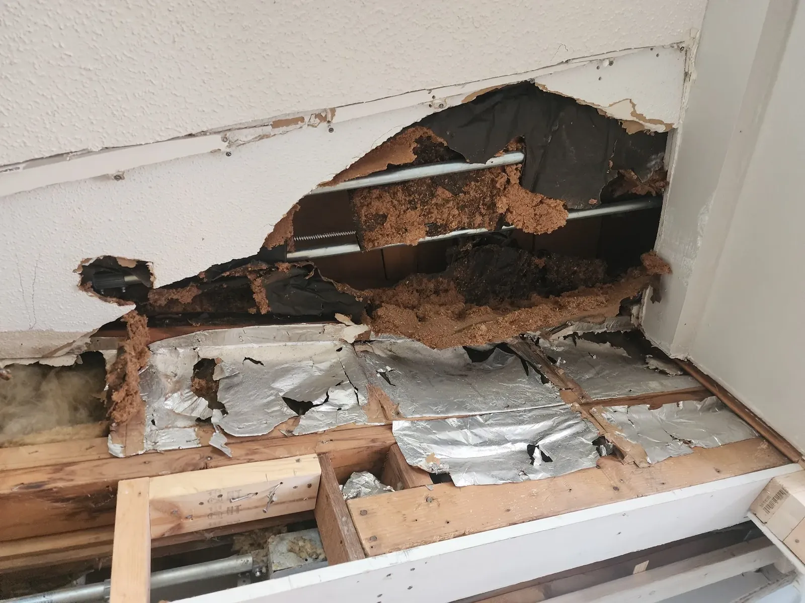 Damaged soffit before repair