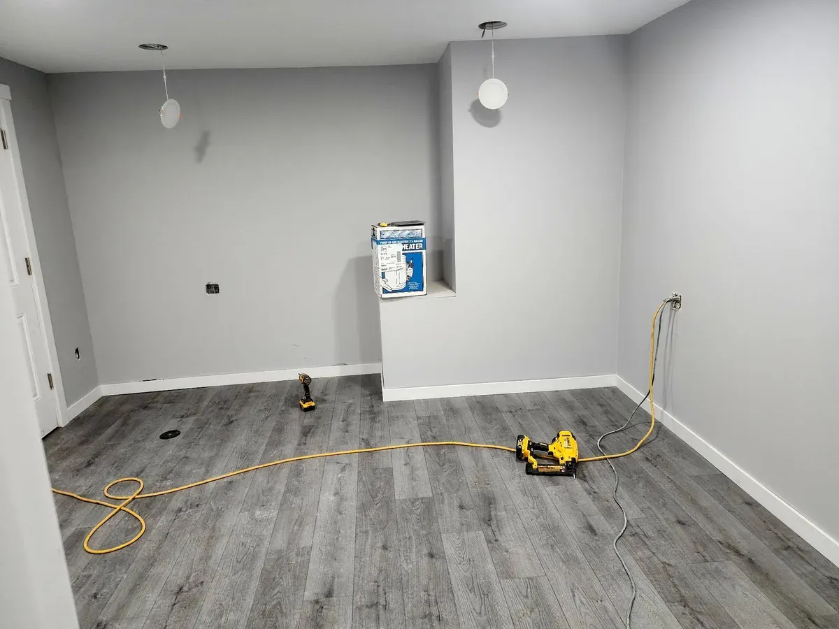 Bathroom with new flooring and paint before the fixtures were installed